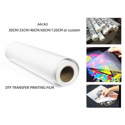 لفّة فيلم نقل DTF 60cm*100m مزدوجة الجانبين صافية متطاطية واضحة قبل المعالجة ورق نقل الحرارة من بي تي بارد و ساخن