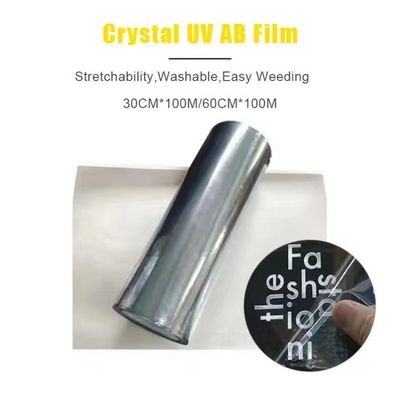 الفيلم الذهبي الفضائي UV DTF لتحويل الفيلم الأبيض الشفاف Ab Pet Film لحالات الهواتف المحمولة