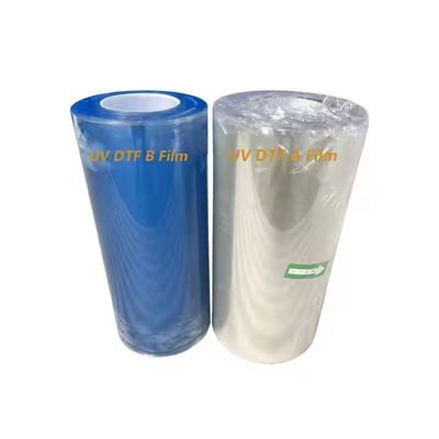 الصفحة الساخنة الباردة Ab A3 UV DTF Pet Film Roll شفاف DTF Transfer Film 60cm حسب الطلب